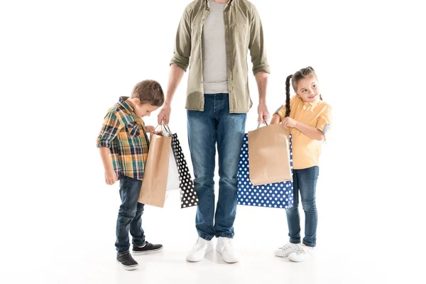 Family with shopping bags — Free Stock Photo