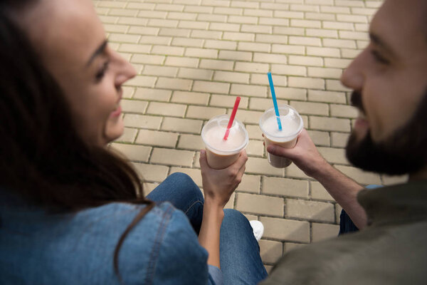 couple with milkshakes