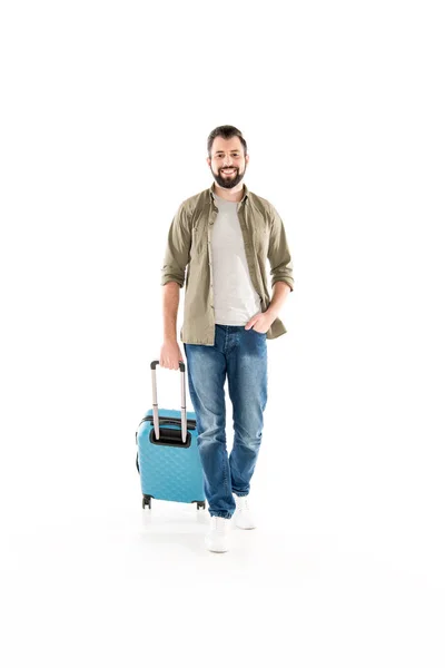 Hombre con maleta de viaje sale