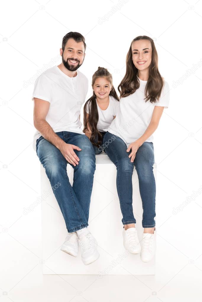 happy parents with daughter 