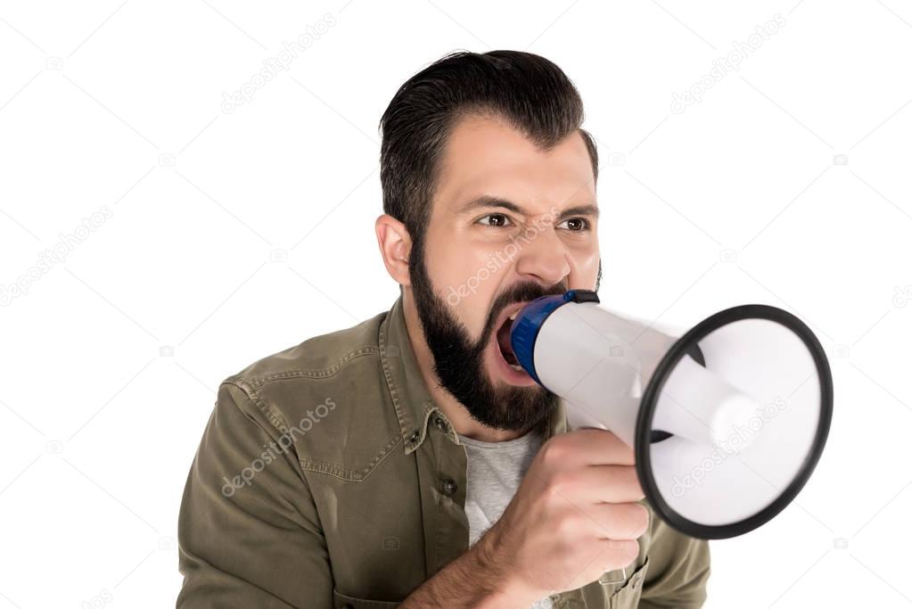 man yelling into megaphone