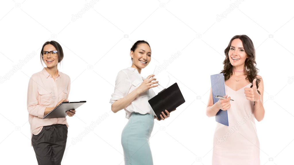 multicultural businesswomen with folders