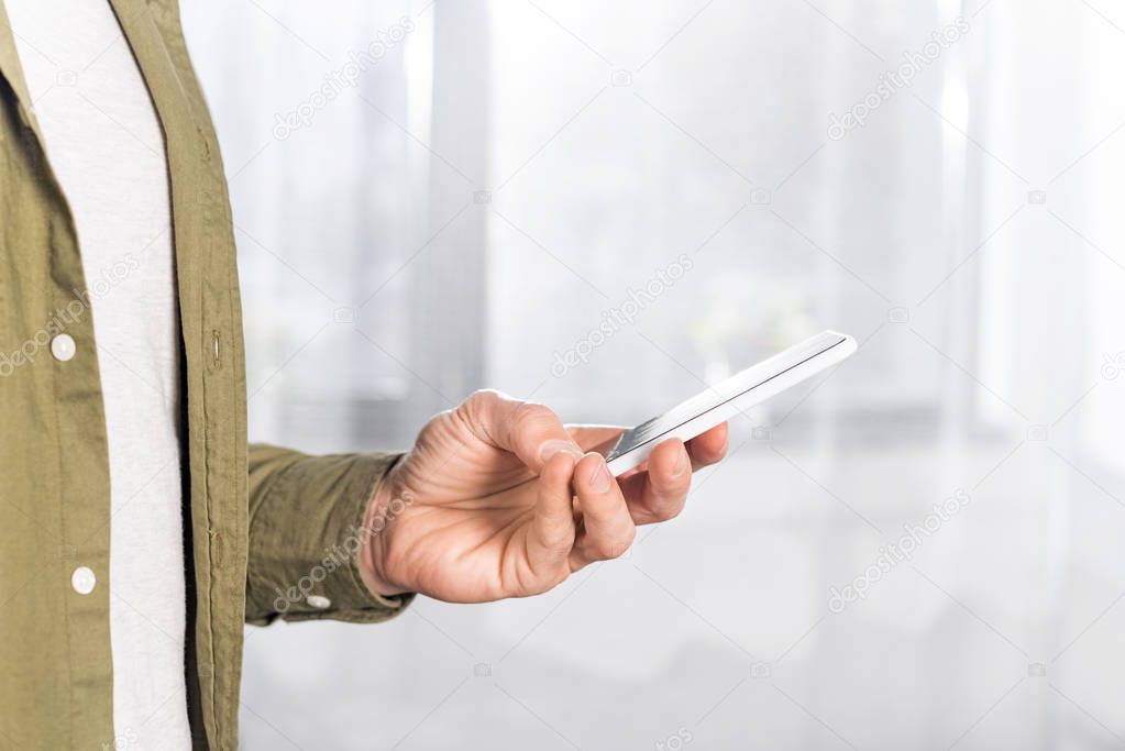 man using smartphone