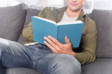 man reading book clipart