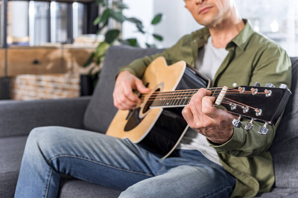 man playing guitar