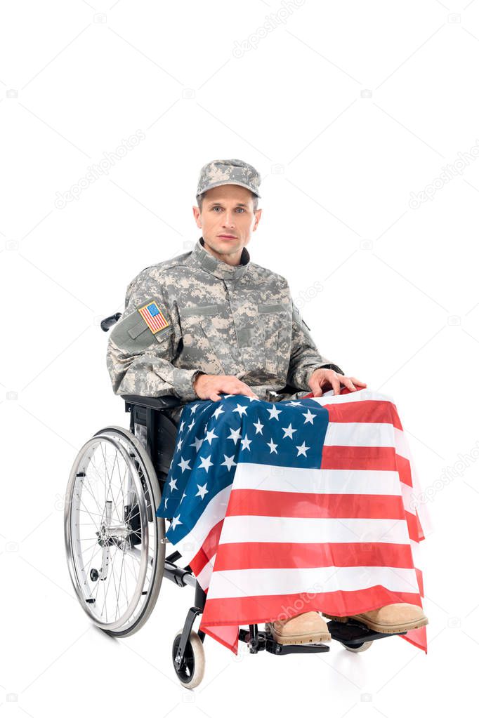 military man in wheelchair with usa flag