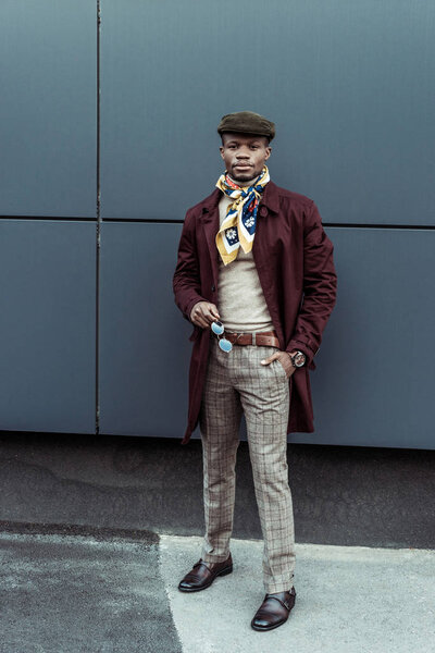 african american man in stylish outfit