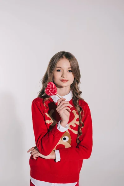 Teenage girl holding candy — Stock Photo, Image