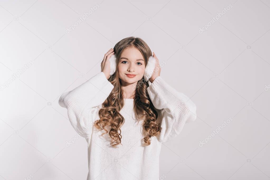 girl in fur earmuffs