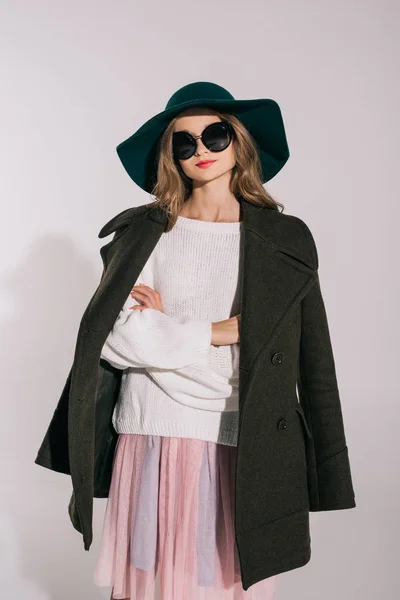 Teenage girl in hat and overcoat — Stock Photo, Image