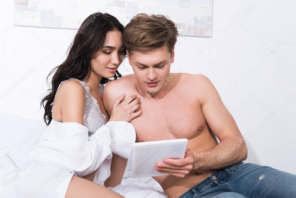 couple using tablet together