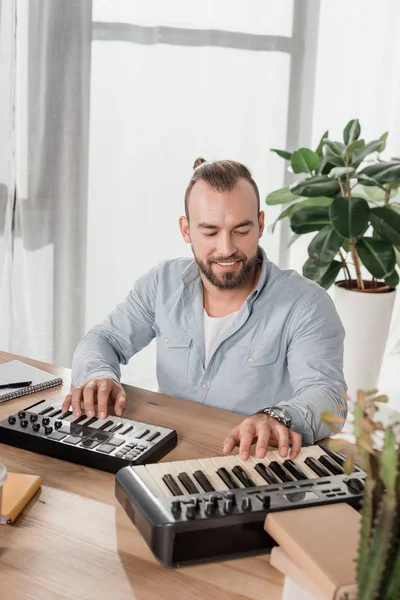 stock image sound producer working with mpc pads