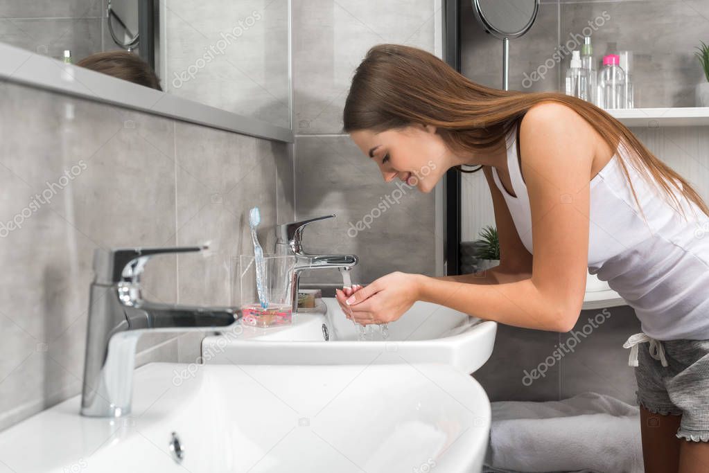 woman going to wash face