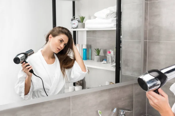 Menina com secador de cabelo — Fotografia de Stock