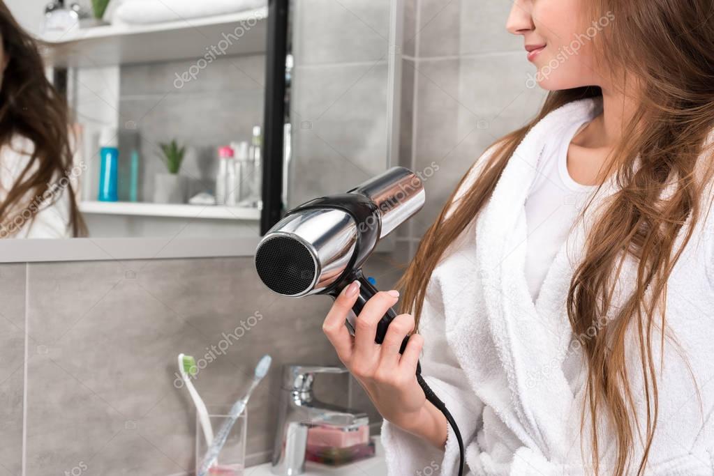 girl drying hair