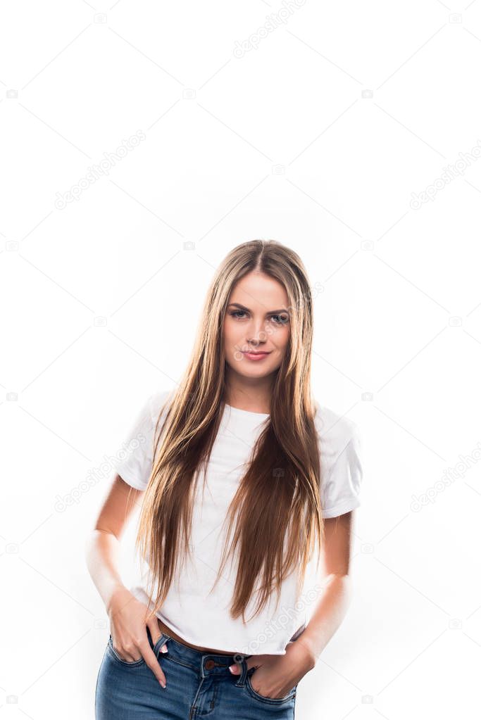 Confident girl with hands in pockets