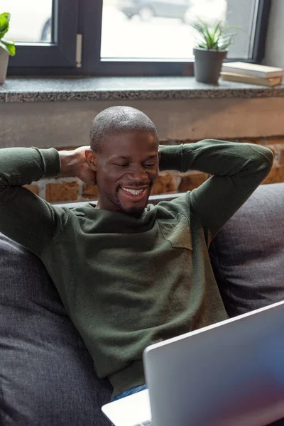 African american man with laptop — Stock Photo, Image