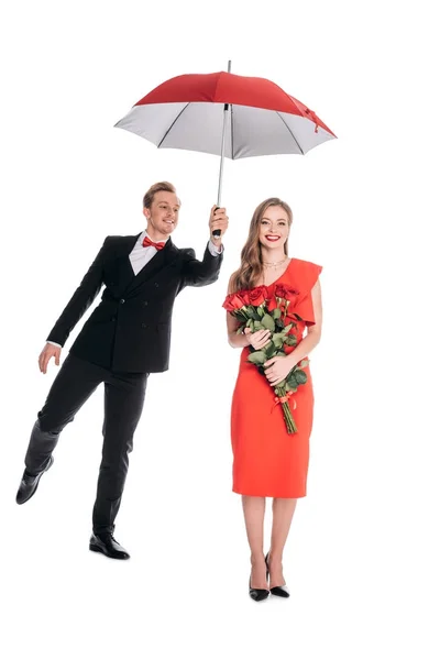 Casal com guarda-chuva e rosas — Fotografia de Stock