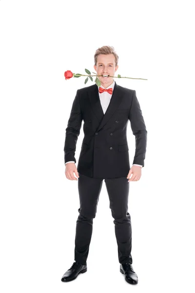 Uomo elegante con rosa nei denti — Foto Stock