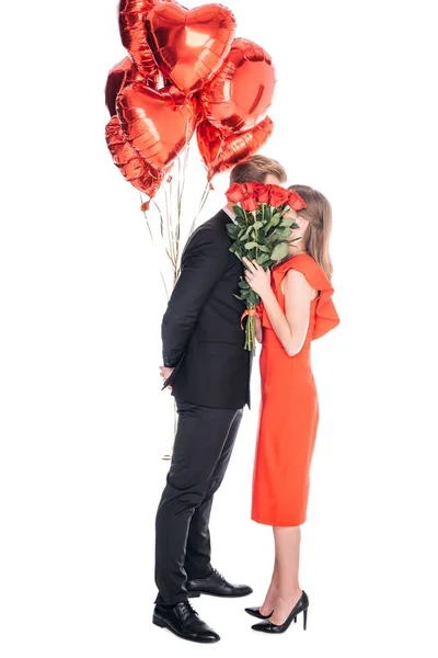 Pareja con rosas y globos — Foto de Stock