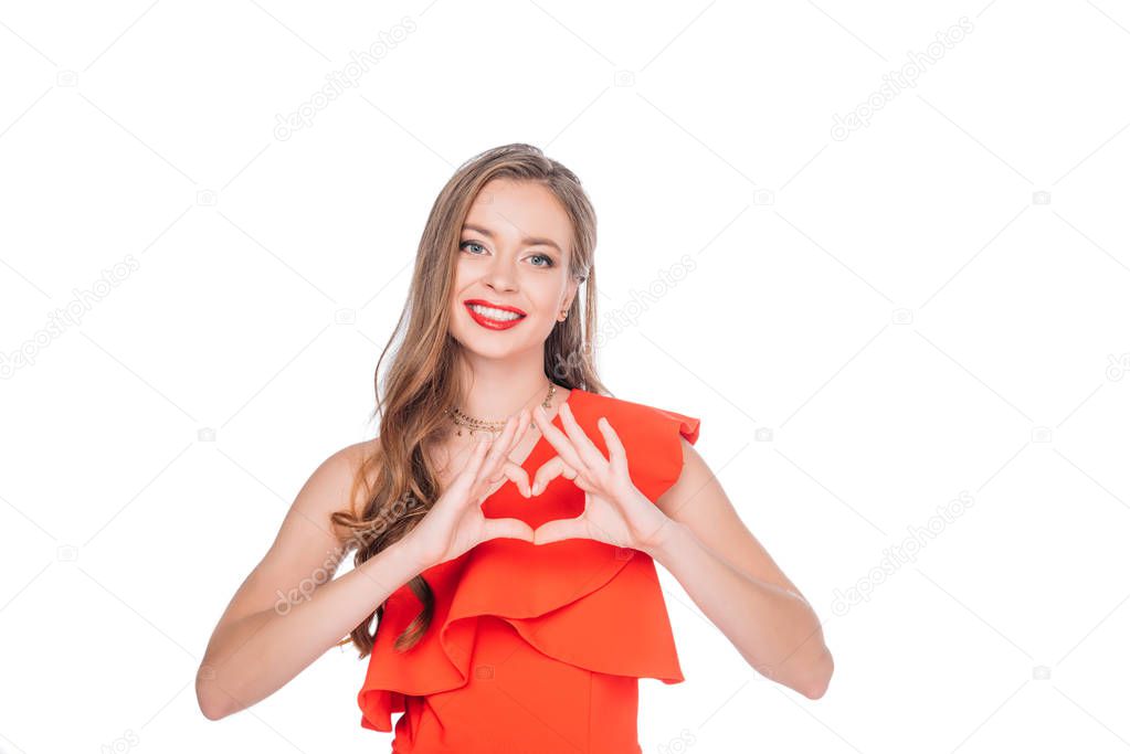 girl showing hand heart