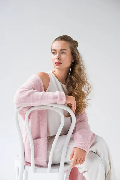 Stylish Girl Sitting White Chair Looking Away Isolated White — Stock Photo, Image