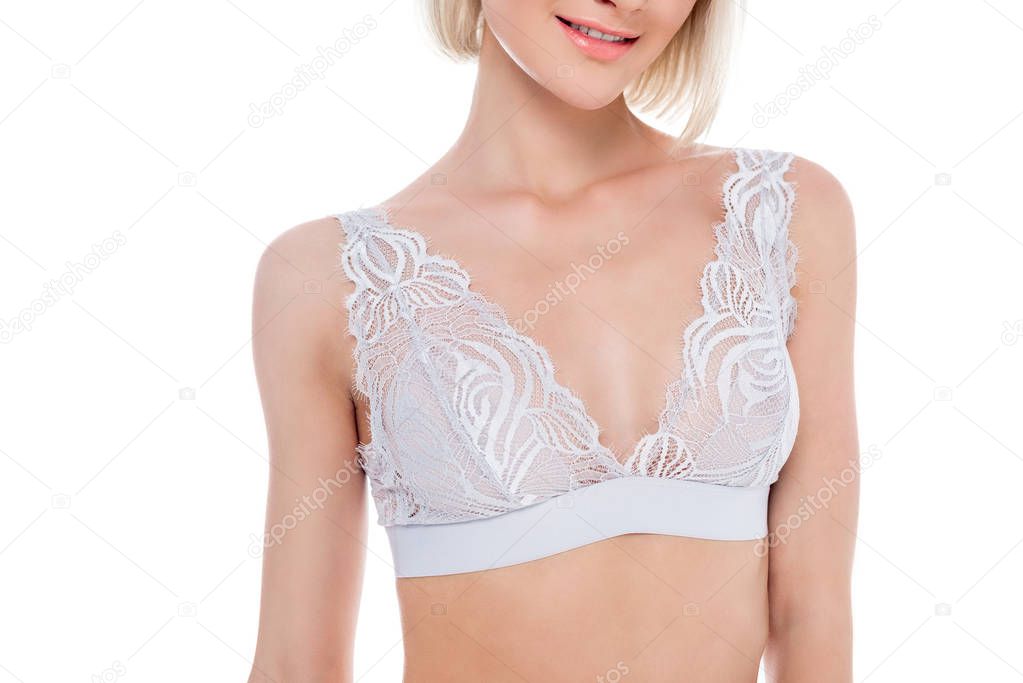 cropped view of girl posing in lace bra, isolated on white