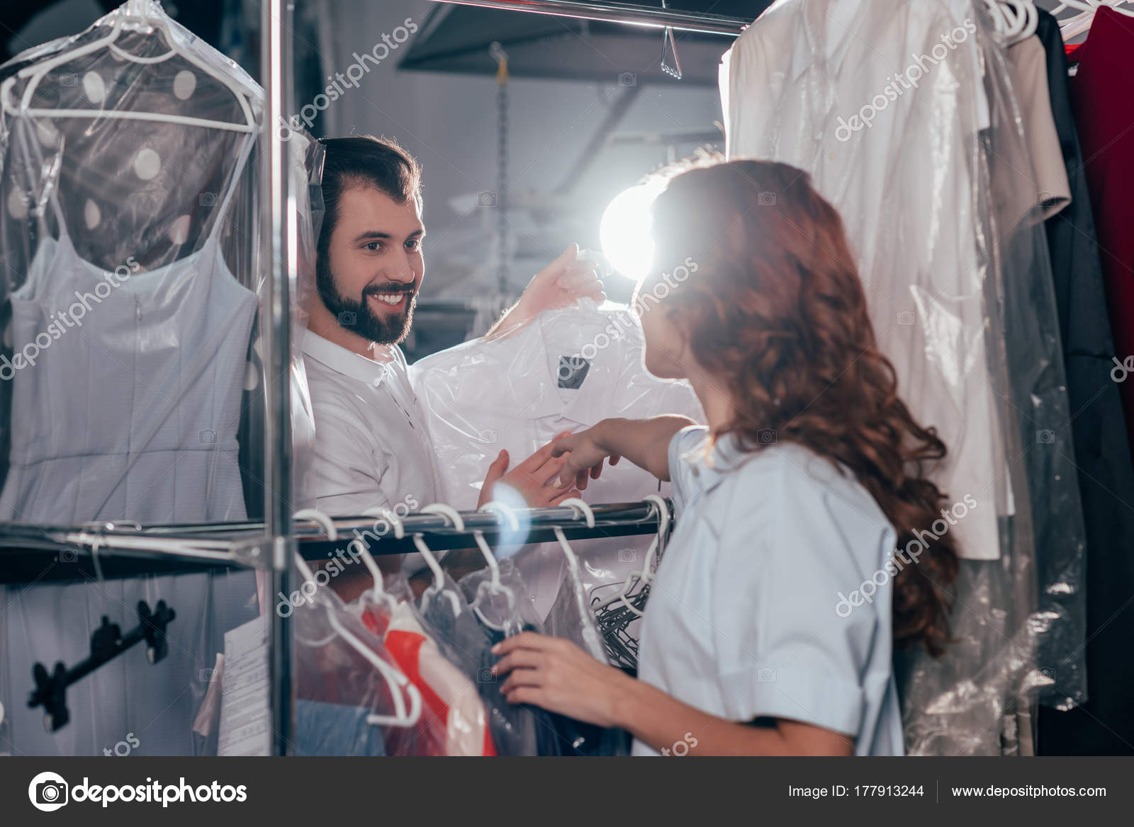 Young Dry Cleaning Workers Talking Warehouse — Stock Photo
