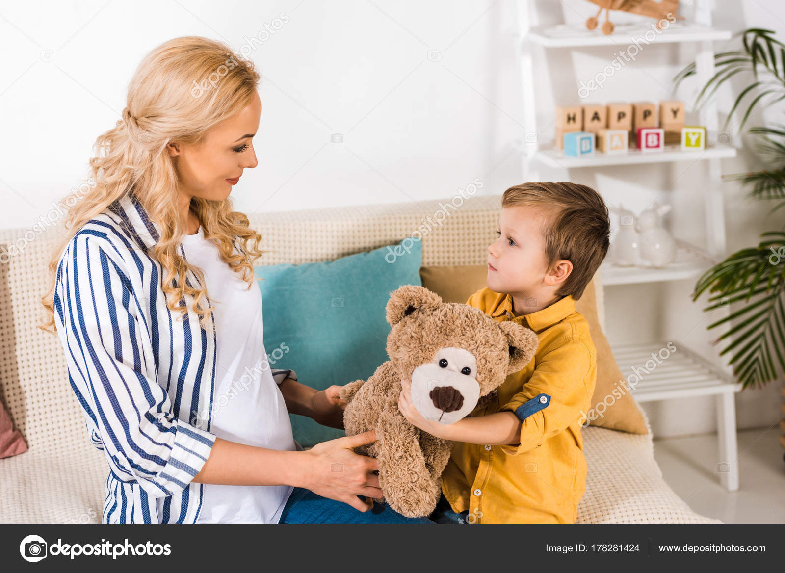 child and teddy bear
