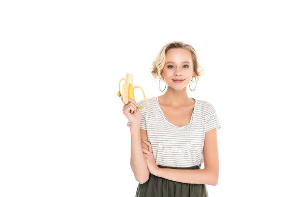 portrait of young smiling woman with fresh banana isolated on white