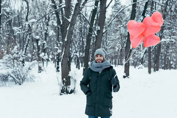 Portrait Young Smiling Man Heart Shaped Balloons Winter Park — Stock Photo, Image