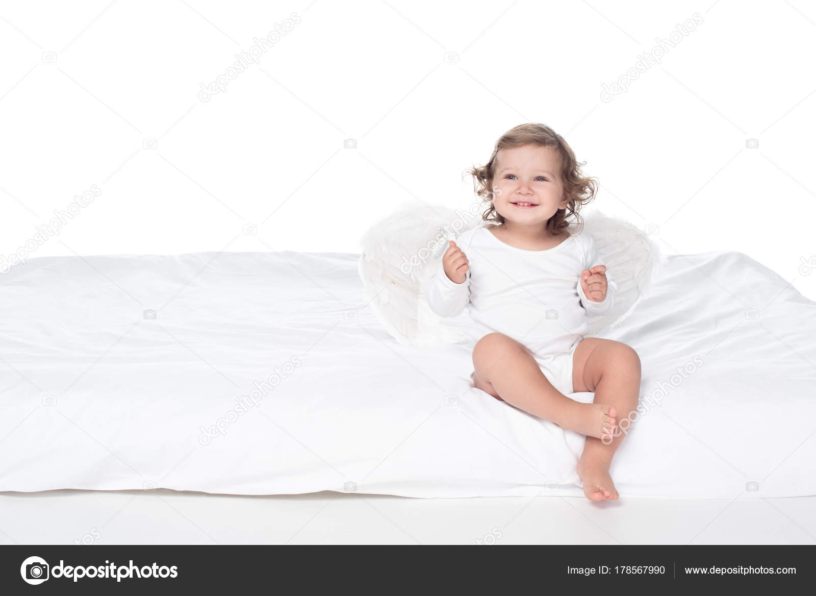 Adorable Happy Baby Wings Sitting Bed Isolated White — Stock Photo