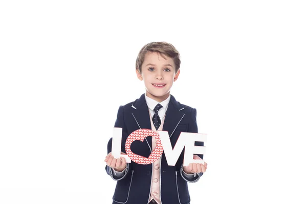 Stylish Little Boy Holding Word Love Smiling Camera Isolated White — Stock Photo, Image