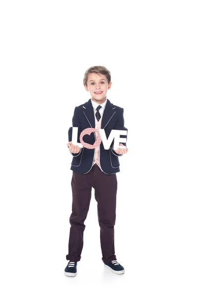 Cute Little Boy Holding Word Love Smiling Camera Isolated White — Stock Photo, Image