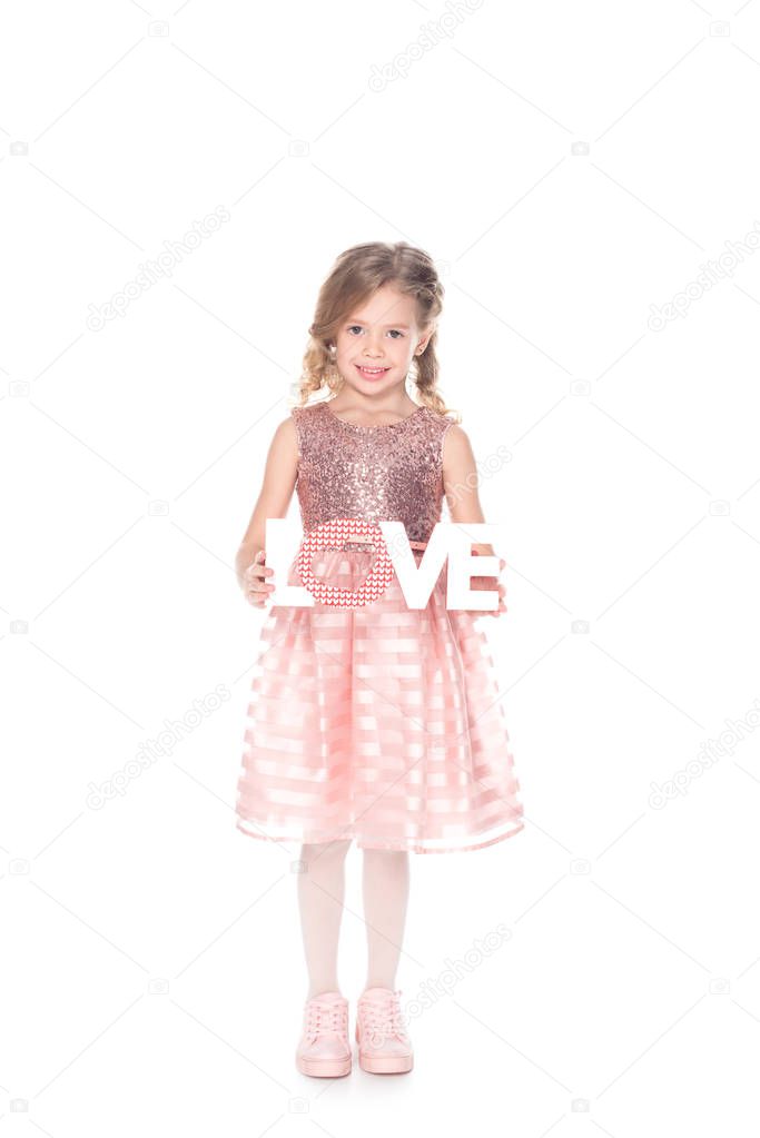 beautiful kid holding love symbol for valentines day, isolated on white