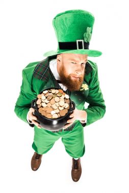 leprechaun in green suit holding pot of gold, isolated on white 