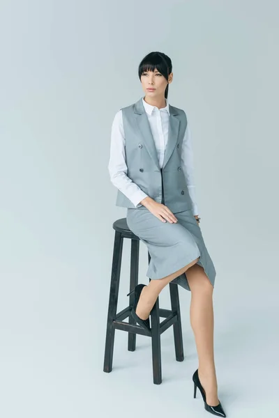 Businesswoman Sitting Chair Looking Away Gray — Stock Photo, Image