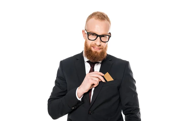 Smiling Bearded Businessman Putting Credit Card Pocket Suit Jacket Isolated — Free Stock Photo