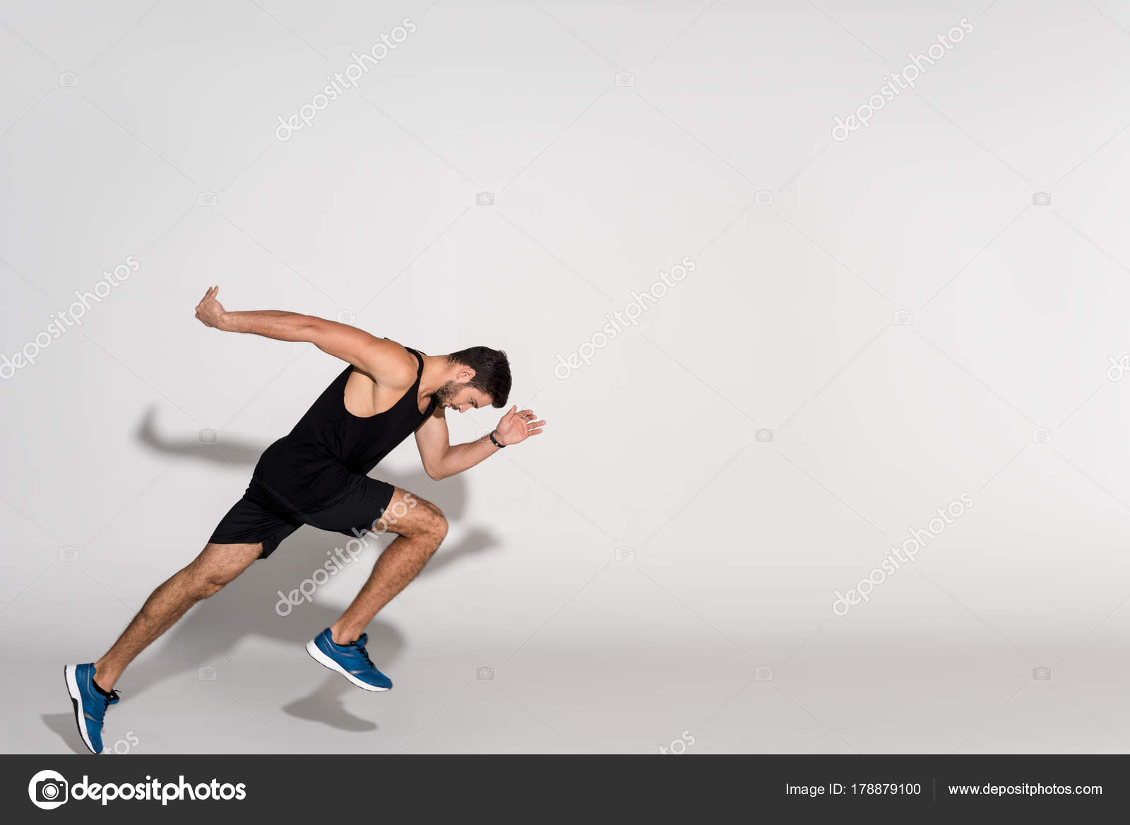 Side view of a woman running stock photo