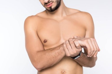 cropped shot of young shirtless man with wrist pain isolated on white clipart