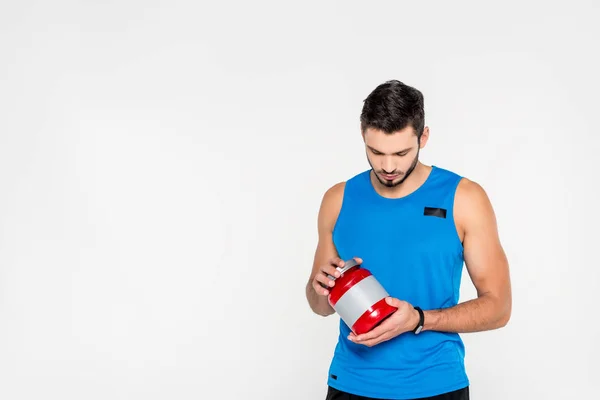 Atlético Jovem Desportista Segurando Esporte Suplemento Jar Isolado Branco — Fotografia de Stock