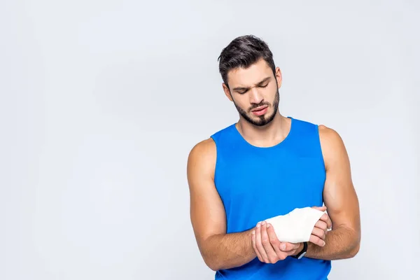 Sportlicher Junger Mann Mit Schmerzen Handgelenk Isoliert Auf Weiß — Stockfoto
