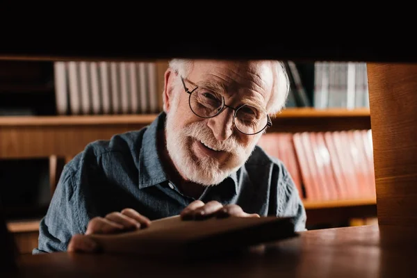 Smiling Grey Hair Librarian Looking Camera Shelf — Stock Photo, Image