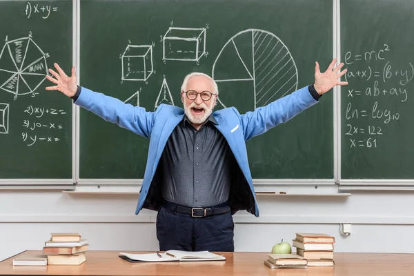 Happy Senior Lecturer Open Arms Standing Blackboard — Stock Photo, Image