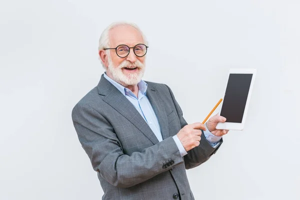 Smiling Senior Lecturer Pointing Tablet Isolated White — Stock Photo, Image