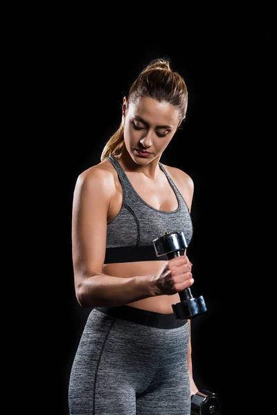 Sporty Young Woman Exercising Dumbbells Isolated Black — Free Stock Photo