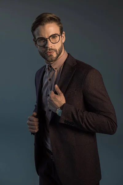 Handsome Stylish Bearded Man Wristwatch Spectacles Looking Camera Isolated Grey — Stock Photo, Image