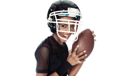 close-up portrait of emotional female american football player with ball and in helmet isolated on white clipart