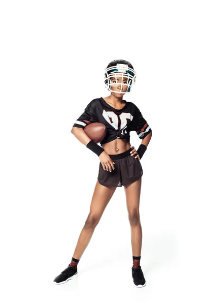 白で隔離のボールで女子アメリカン フットボール選手  — 無料ストックフォト