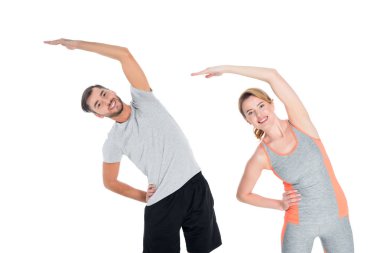 Sportif çift birlikte izole üzerinde beyaz egzersiz